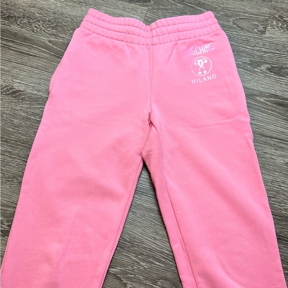 Moschino logo-print cotton sweat pants. Pink - Picture 11 of 11